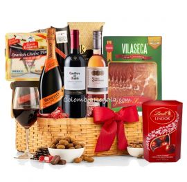 Regala la experiencia de celebrar en grande con la Cesta Gourmet Deluxe Montecarlo, que incluye vinos selectos y manjares. ¡Impresiona a tus clientes esta Navidad!